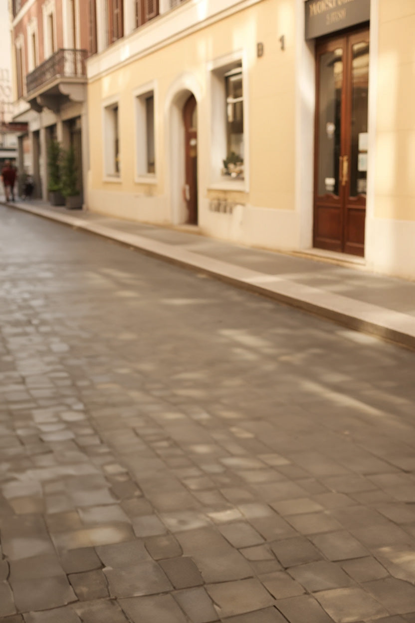 Charming cobblestone street with classic European-style buildings