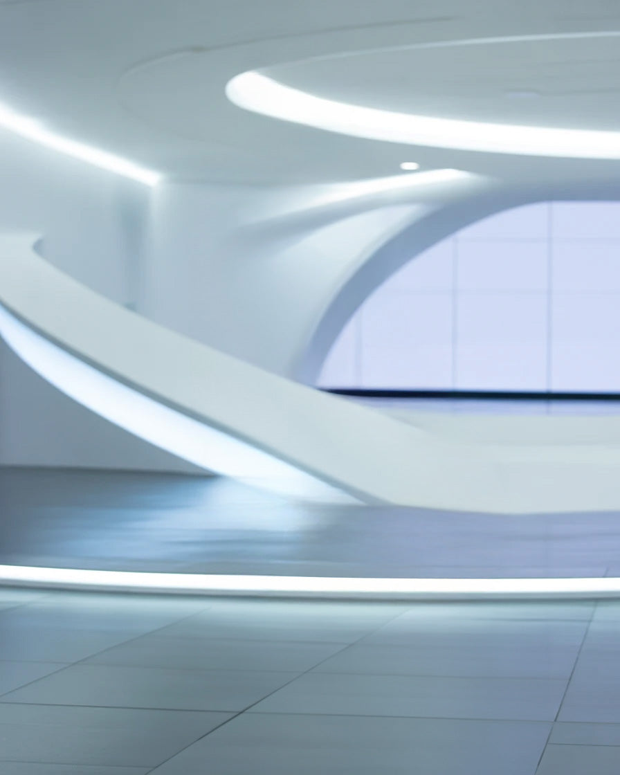Futuristic white interior with curved architecture and glowing lights