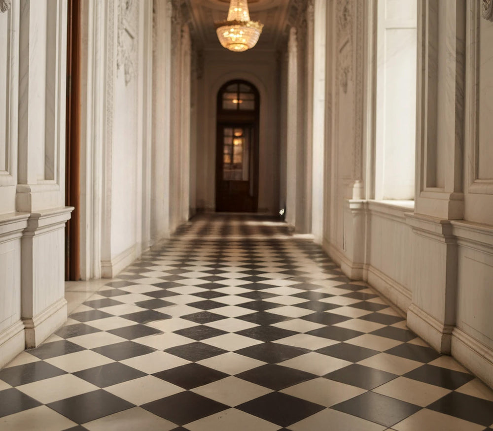 Elegant hallway with black and white checkered floor and chandelier