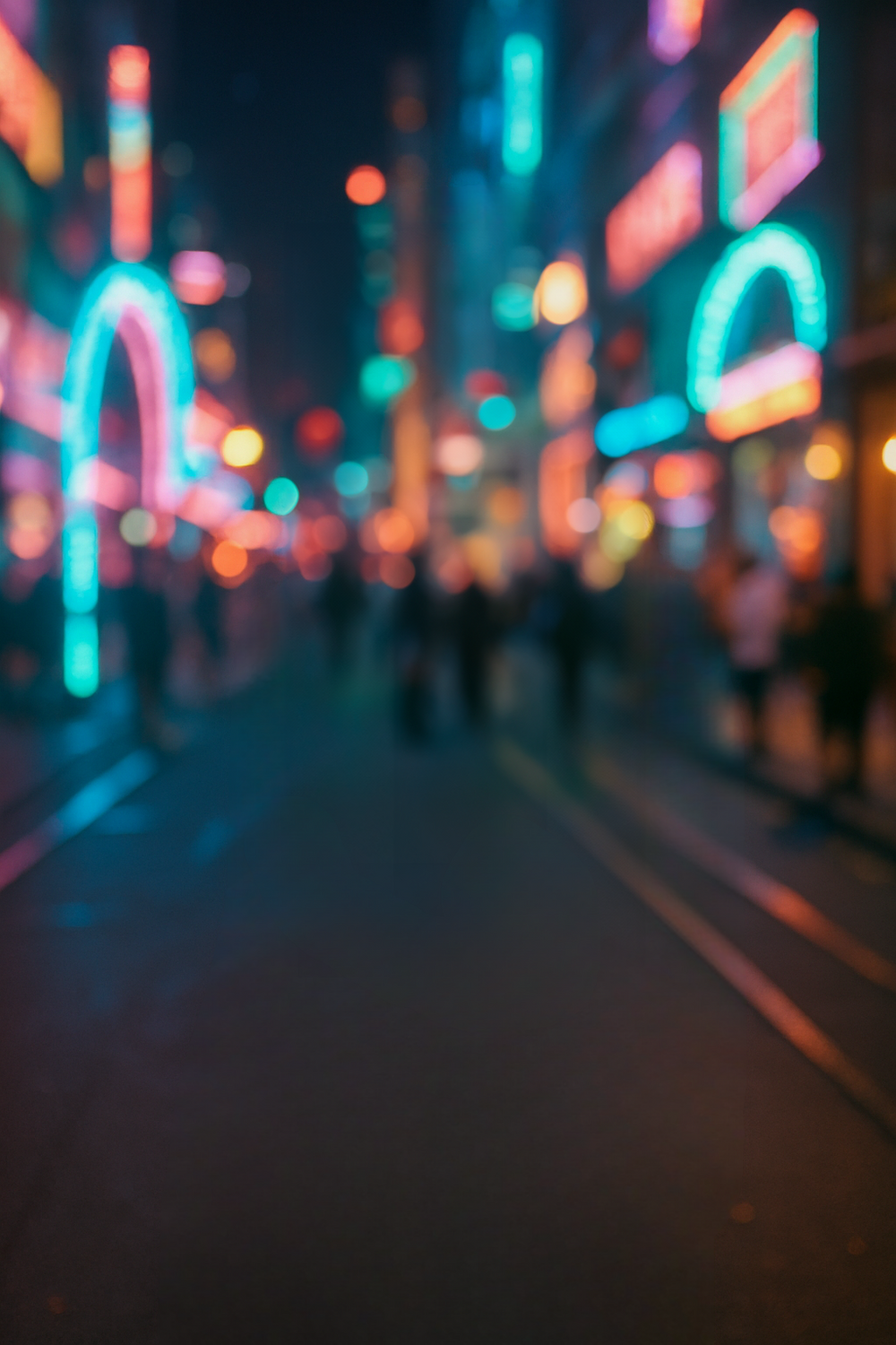 Vibrant neon-lit city street bustling with nightlife activity