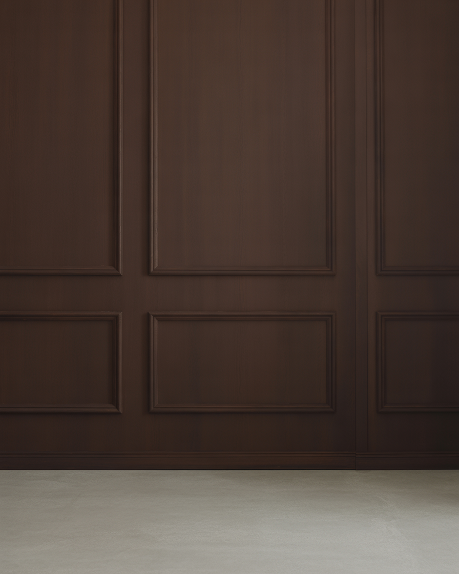 Dark wooden paneled wall with classic molding