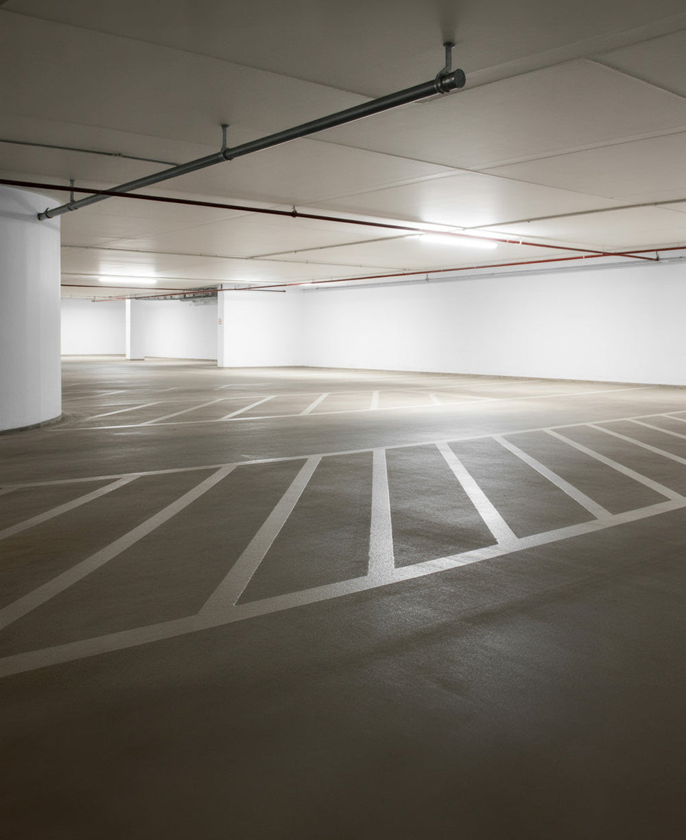 Minimal underground parking garage with clean concrete lines